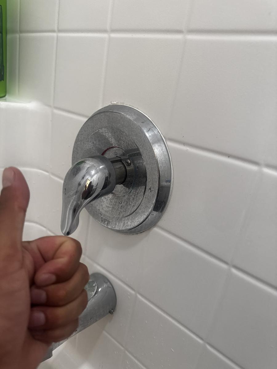 New single-handle shower valve trim installed on tile